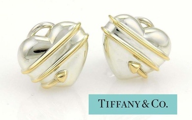 TIFFANY CUPID ARROW HEART EARRINGS 18Kt GOLD and SILVER This lovely and elegant pair of earrings