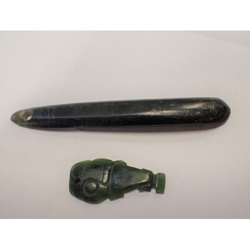 TWO NEW ZEALAND GREEN STONE PENDANTS, ONE IN THE FORM OF A T...