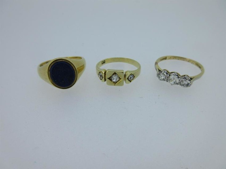 Three diamond or gemset rings testing for 18ct gold
