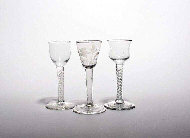 Three small wine glasses c.1760, one with a rounded funnel...