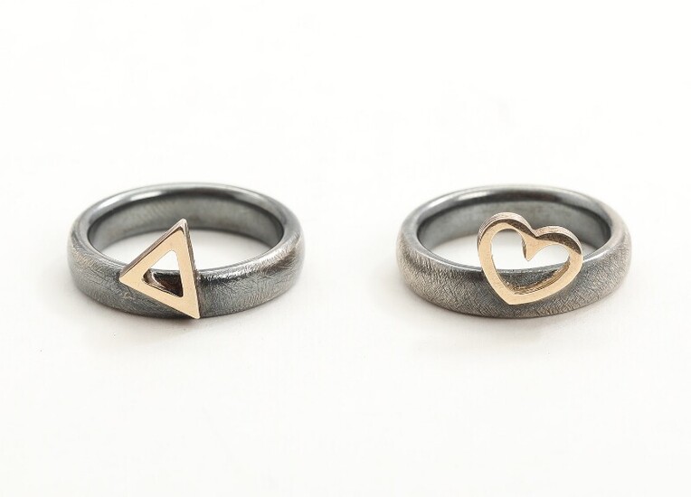 NOT SOLD. Toftegaard: Two 14k gold and partly oxidized sterling silver rings. Size 53 and...