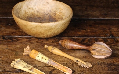 Two Antique Bone Apple Corkers, a treen pastry jigger, lemon juicer, and a treen bowl. One corer inc