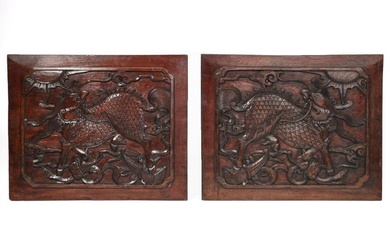 Two Chinese raised relief wood panels