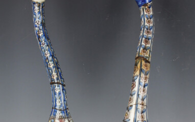 Two Persian tin glazed earthenware swan-neck bottle vases (ashkdan), late 19th/early 20th century, e