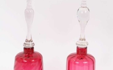 Two Victorian cranberry tinted glass bells