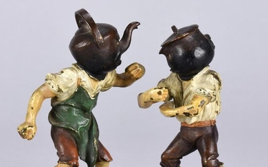 Vienna Bronze (early 20th Century) A cold painted bronze group of a pot and kettle fighting animated as two young men. Titled 'Pot calling the Kettle black'. Circa 1900. Height 11 cm.