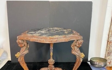 3 LEGGED CARVED TABLE WITH ANGEL MOTIF WITH MARBLE TOP