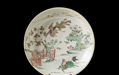 A Famille Verte porcelain dish decorated with a qilin, with wood support (defects and restorations) China, Qing dynasty, Kangxi period...