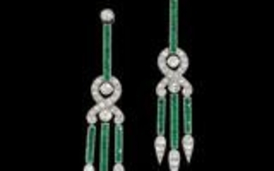 A pair of diamond and emerald ear pendants