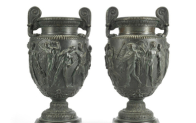 A pair of late 19th century French patinated bronze garniture urns