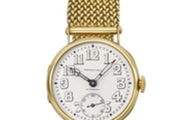 Patek Philippe. A fine, rare and early 18K gold hinged wristwatch with enamel dial, retailed by Tiffany & Co., SIGNED TIFFANY & CO., SWITZERLAND, OFFICIER MODEL, MOVEMENT NO. 187’641, CASE NO. 283’774, MANUFACTURED IN 1917