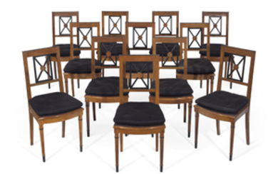 A SET OF TWELVE NORTH EUROPEAN FRUITWOOD AND PARCEL-EBONIZED DINING CHAIRS, SECOND QUARTER 19TH CENTURY