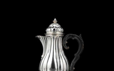A silver coffee pot. Reggio Emilia, 1770 ca. (h. cm 31) (g gross 929 ca.) For comparison see: M. Agnellini...