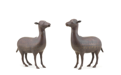 A pair of Qajar silver-damascened steel sheep, Persia, 19th Century