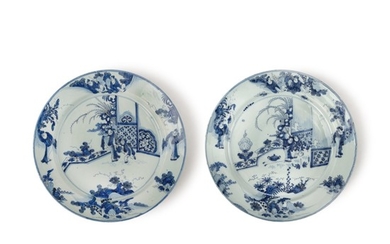 TWO SIMILAR DUTCH DELFT BLUE AND WHITE LARGE CHARGERS, LATE 17TH CENTURY