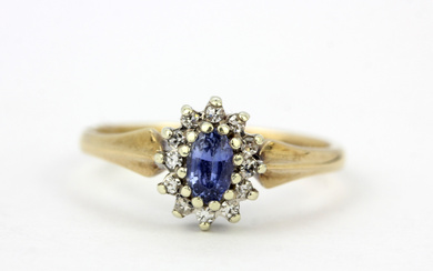 9CT GOLD SAPPHIRE AND DIAMOND RING.