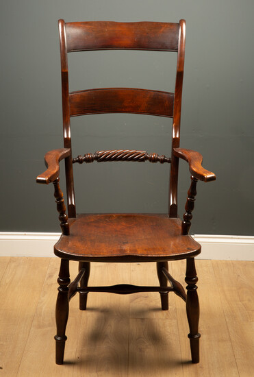A 19th century high back Oxford pattern armchair