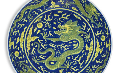A BLUE AND YELLOW 'DRAGON' SAUCER-DISH Qianlong six-character seal mark...