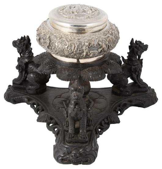 A BURMESE SILVER BOWL AND COVER ON WOOD STAND,...