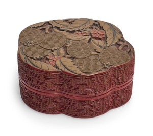 A CARVED POLYCHROME LACQUER 'LOQUAT' BOX AND COVER QING DYNASTY, QIANLONG PERIOD
