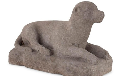A Carved Stone Recumbent Dog, In the Manner of