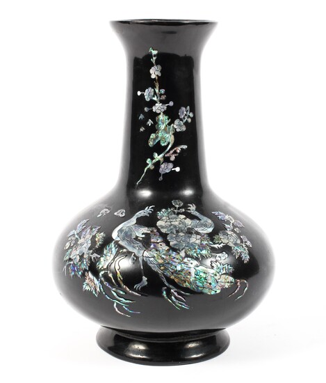 A Chinese 20th century black lacquer and papier mache vase, with compressed globular body