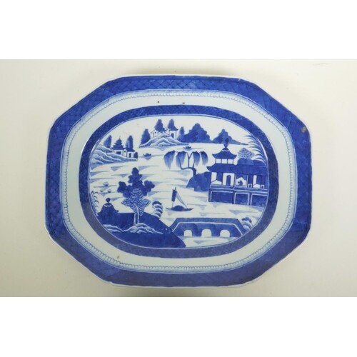A Chinese blue and white porcelain meat dish with riverside ...