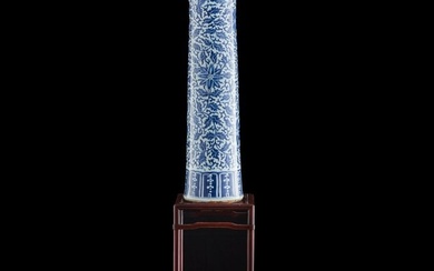 A Chinese blue and white 'scrolling flower' gu vase, 19th century