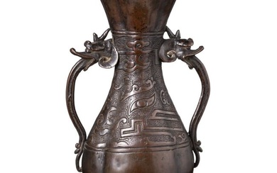 A Chinese bronze quatrefoil altar vase, Ming Dynasty, 15th century
