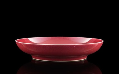 A Chinese copper-red-glazed plate, Yongzheng period, Qing dynasty