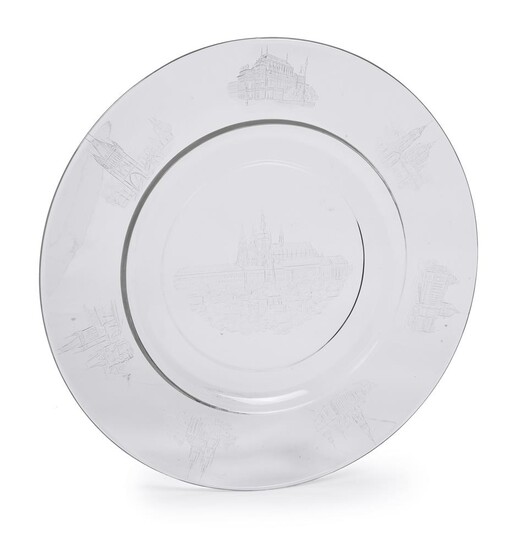 A Czech clear glass and engraved topographical charger with prominent Prague landmarks