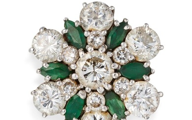 A DIAMOND AND EMERALD CLUSTER RING set with a round brilliant cut diamond in a cluster of marquise
