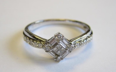 A Diamond Ring claw-set cluster of four princess-cut stones...