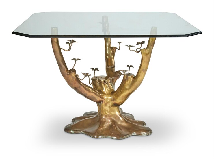 A GILT METAL AND GLASS DINING TABLE, MANNER OF JACQUES DUVAL-BRASSEUR