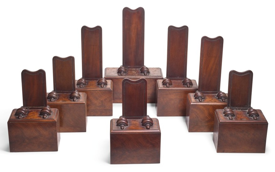 A GROUP OF EIGHT WILLIAM IV MAHOGANY PLATE STANDS, CIRCA 1830, IN THE MANNER OF GILLOWS