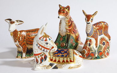 A GROUP OF FOUR ROYAL CROWN DERBY PAPERWEIGHTS.