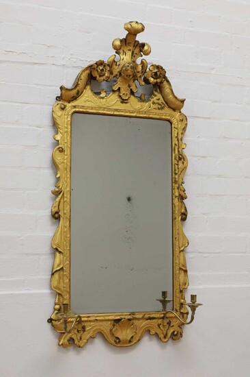 A George II-style carved giltwood wall mirror