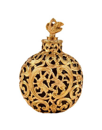 A George III gold-mounted hardstone scent bottle, London, mid-18th century, of flask form, overlaid on both sides with pierced cagework of c-scrolls, centred by boxing hares, the stopper with goose finial, 6.4cm high