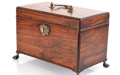 A George III mahogany box, the interior with three compartments,...