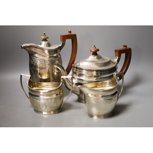 A George V three piece silver oval tea set, London, 1930, to...