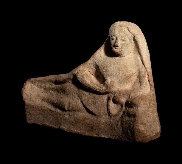 A Greek Terracotta Reclining Figure