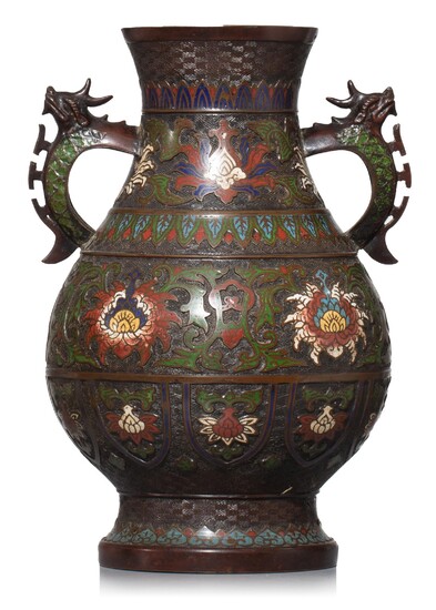 A Japanese champlevé bronze vase, paired with dragon handles, 19thC, H 43 cm