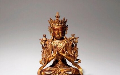 A LARGE CHINESE GILT-LACQUERED BRONZE FIGURE OF MANJUSRI QING DYNASTY...