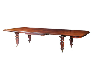 A LARGE WILLIAM IV MAHOGANY EXTENDING DINING TABLE.
