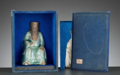 A LONGQUAN CELADON AND BISCUIT FIGURE OF AN IMMORTAL, MING DYNASTY