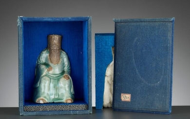 A LONGQUAN CELADON AND BISCUIT FIGURE OF AN IMMORTAL