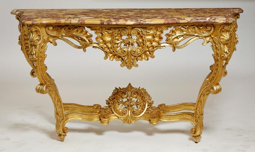 A Louis XV style carved giltwood console