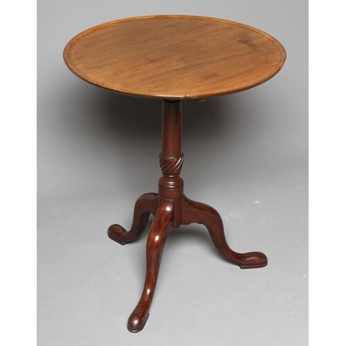 A MAHOGANY TRIPOD TABLE, the dished circular top with cheque...