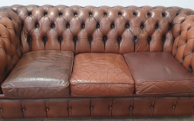 A MORAN CHESTERFIELD THREE SEATER LOUNGE