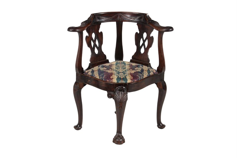A Mid-18th century and later carved mahogany corner chair